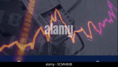 Displaying point-of-sale terminal on desk with card slot, glowing chart lines binary overlay Stock Photo