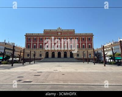 Neoclassical town hall in Plaza del Rey, San Fernando, Spain, showing facade with columns, pediment and imperial marble staircase of the largest munic Stock Photo