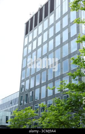Contemporary glass and concrete office building angular view Warsaw, Poland Stock Photo