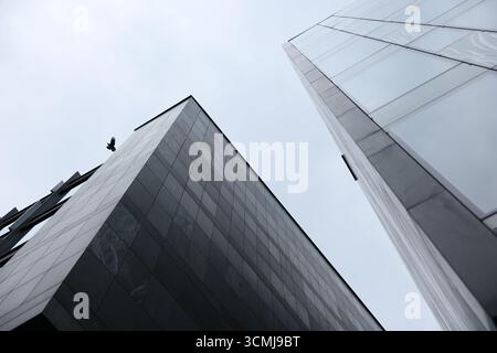 Modern office building dramatic upward angular perspective view Warsaw, Poland Stock Photo