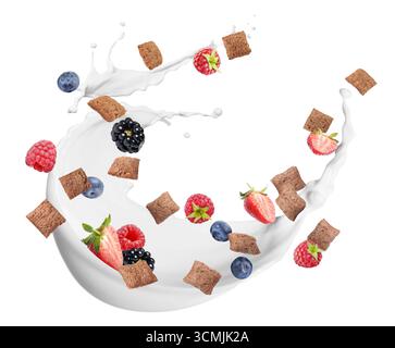 Splashing milk with sweet corn pads and fresh berries in air against white background. Healthy breakfast Stock Photo
