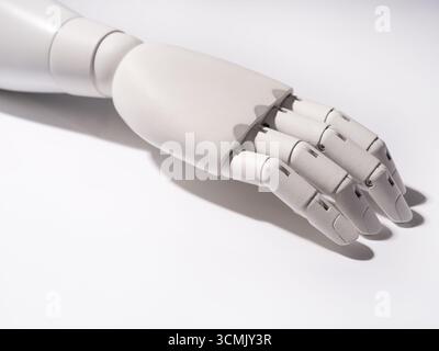 The robot's hand is on a white background Stock Photo