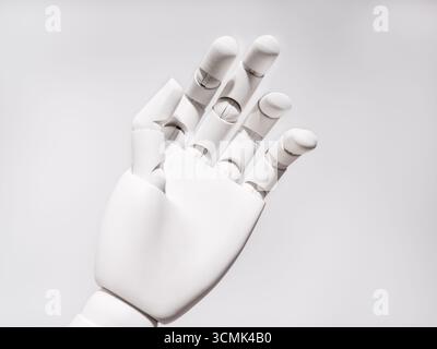 The robot's hand is on a white background Stock Photo