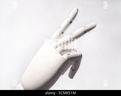 The robot's hand making a 'V' sign Stock Photo