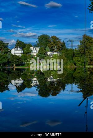 Lakefront Properties Reflected in Caputher See on a Summer Day, Western Shore in Caputh, Brandenburg, Germany Stock Photo