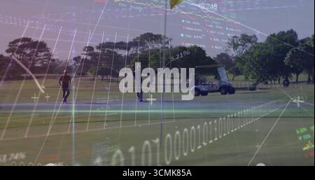Swinging and walking two friends in polos on golf course fairway, with clubs, cart, chart overlay Stock Photo