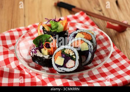 Korean Roll Gimbap or Kimbap Made from Steamed White Rice (bap) and Various Other FIlling Ingredients Wrapped with Nori Laver Stock Photo