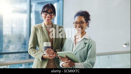 Portrait, mentor and women in office with tablet, skill growth and support in corporate job. Smile, marketing director and intern in agency with tech Stock Photo