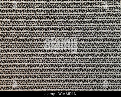 Close-up of multilayer cardboard material. Background Stock Photo