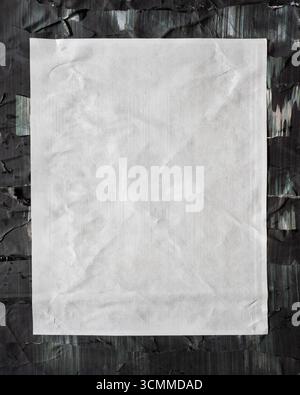 Vertical 4x5 white paper glued onto an abstract grunge black paper background Stock Photo