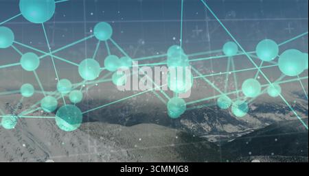 Digital network hovering over snowy mountains, linking glowing teal spheres with connecting lines Stock Photo