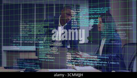 Two business professionals wearing blazers inspecting documents in office, with green grid overlay Stock Photo