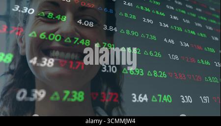 Analyzing woman interacting with digital interface in office, showing stock tickers, copy space Stock Photo