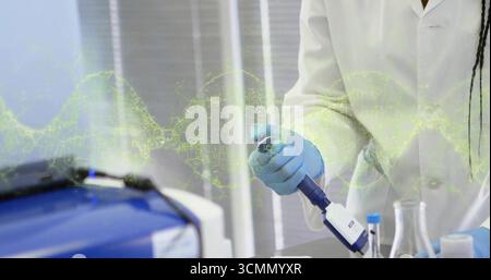 Holding pipette, scientist wearing gloves dispensing into tube at lab with DNA graphic, copy space Stock Photo