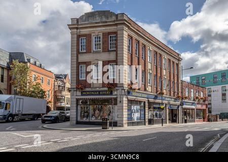 Montague Jeffery mens outfitter on the corner of St Giles and Derngate in the town centre, Northampton, England, UK. Stock Photo