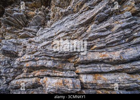 Close up on sedimentary rocks along path from Oldt Town to Mogren Beach in Budva, Montenegro Stock Photo
