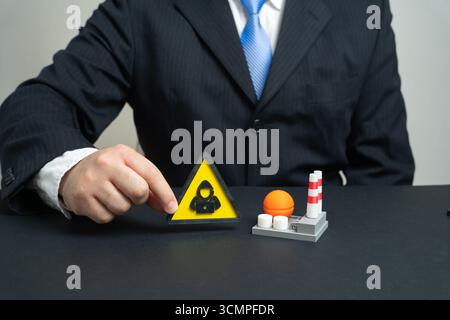 The threat of cyberattacks on the energy and industrial sectors. Hackers attack the economy and enterprises, hybrid warfare. Symbol of digital securit Stock Photo