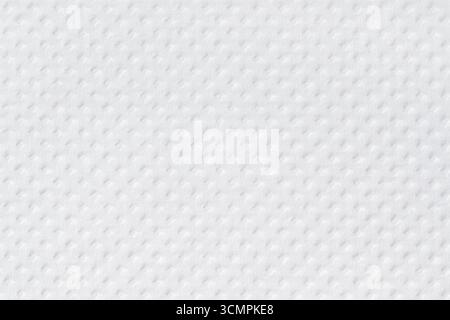 Light textile background with a clear texture and a small geometric pattern. A solid white surface with a soft three-dimensional effect. Stock Photo