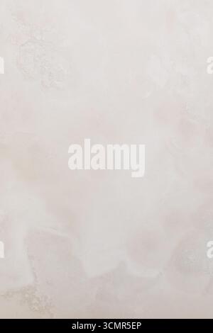 Soft beige textured background with subtle variations, perfect for design projects, presentations, and creative works Stock Photo