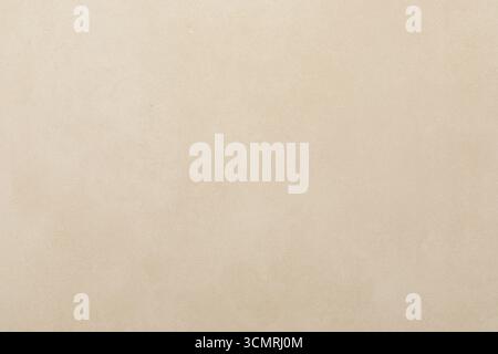 Neutral textured wall surface with subtle variations in color and tone for an inviting backdrop in various settings Stock Photo