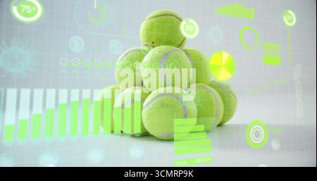 Displaying neon green tennis ball pyramid on studio table with bar, line, circle, numeric overlays Stock Photo