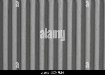Texture of recycle paper box in old vintage pattern for design art work, close up. White grey striped cardboard sheet abstract background Stock Photo