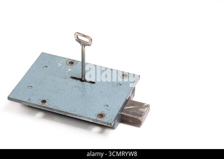 Old internal door lock with key on white background Stock Photo