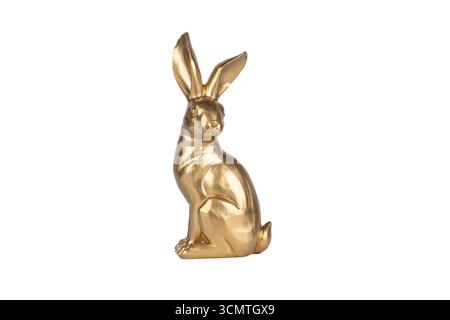 Adorable cute gold easter bunny tabletop figurine Stock Photo