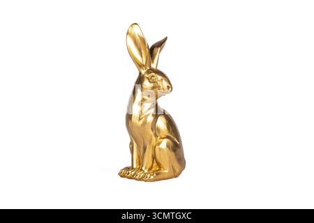 Adorable cute gold easter bunny tabletop figurine Stock Photo