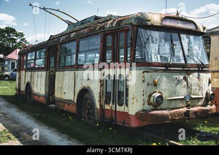 Rusty Vintage Trolleybus in Outdoor Transport Museum Stock Photo