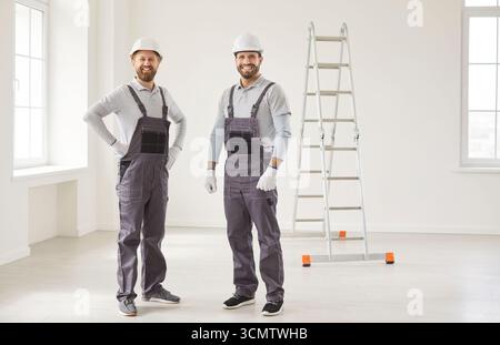 Repair team, restoring workers on construction project, building architectural plan, real estate Stock Photo