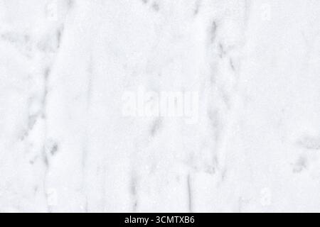 Clean white marble surface from Carrara quarries showing elegant natural gray veins. Premium Italian stone texture perfect for luxury design and archi Stock Photo