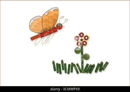 Electronic components in the shape of a butterfly and flower. White background. Stock Photo