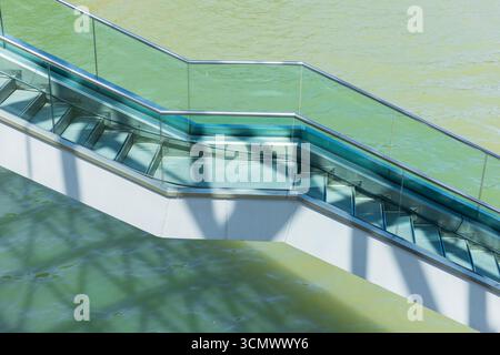 One of the floating stairways of the Bridge of Peace (2010) over the Kura River in Tbilisi, Georgia Stock Photo
