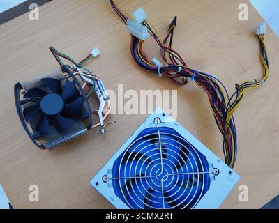 Computer cooler on a radiator covered with dust. Stock Photo