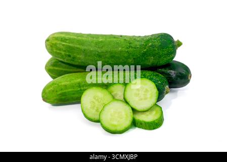 Fresh green cucumber with slices isolated on white background Stock Photo