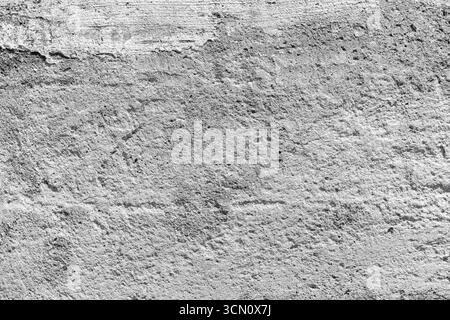 Gray concrete wall texture showing rough and weathered patterns, ideal for backgrounds or design uses. Abstract background photo texture Stock Photo