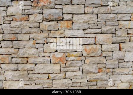 Old structured stone wall Stock Photo