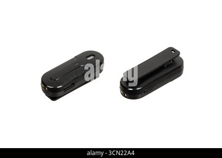 Two black wireless microphones shown from different angles. Stock Photo