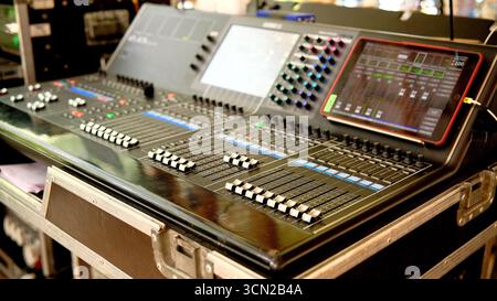 Professional audio equalizer DJ remote control in studio. Sound and music recording industry. Modern sound equipment. Selective focus. Stock Photo