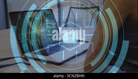 Showing code on laptop screen at home desk with pen over notebook, eyeglasses and lock overlay. Cybersecurity, technology, innovation, protection, dat Stock Photo