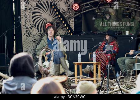 Merlin Sheldrake speaks on fungi and his book Entangled Life during a panel at the All Things Fungi Festival, exploring mycology and nature’s networks Stock Photo