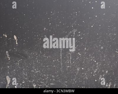 Grey wall texture with dirty splattered concrete stains Stock Photo