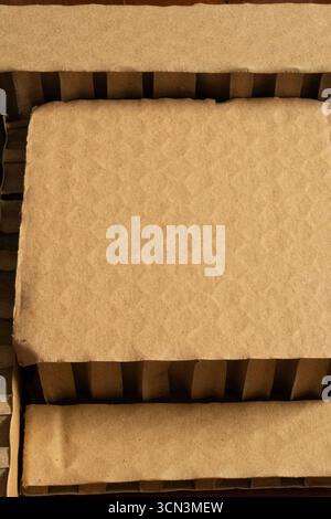 Thick cardboards for packaging protection neatly placed next to each other Stock Photo