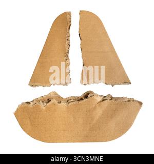 Sailboat shape created from triangular and trapezoidal torn cardboards Stock Photo