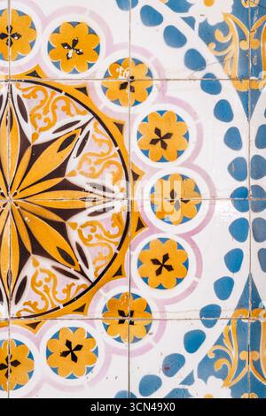 Traditional Portuguese Azulejo Tiles With Blue And Yellow Geometric Patterns In Porto. Historic Ceramic Wall Decoration, Architecture, Tilework Stock Photo