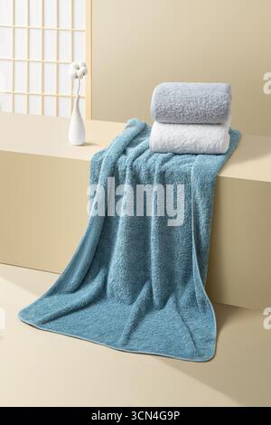 Soft and Luxurious Bath Towels in Teal, Gray, and White - Spa-Like Bathroom Set Stock Photo