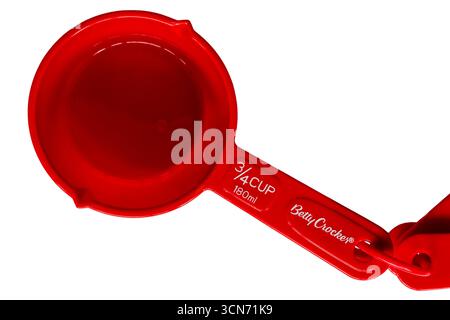 red Betty Crocker measuring cup size 3/4 cup180ml set on white background Stock Photo