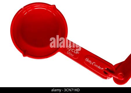 red Betty Crocker measuring cup size 1/2 cup 120ml set on white background Stock Photo