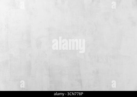 This background features a smooth, empty space with a light gray texture, ideal for use in digital designs, wallpapers, and other creative projects. I Stock Photo